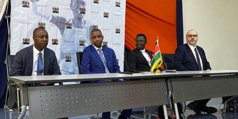 Sports CS Ababu Namwamba (second from right) sitting alongside a FIFA and CAF delegation in a press conference in Nairobi on January 9, 2022. 