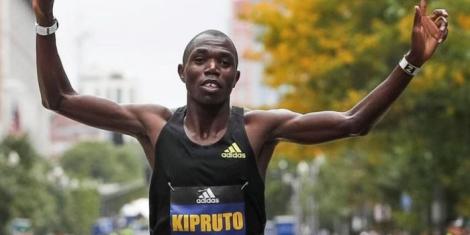 Benson Kipruto celebrate winning the 2021 Boston Marathon title.