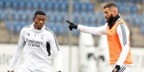 From left to right: French forward Karim Benzema takes part in a Real Madrid training session alongside David Alaba on December 11, 2022, in Spain.