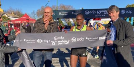 Kenyan-born United States runner Betsy Saina (at the centre) poses for a photo after winning the 2023 Seville Half Marathon on January 29, 2023, in Spain. 