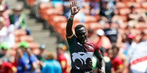 Former Shujaa player Collins Injera waves to the fans during a past international match.