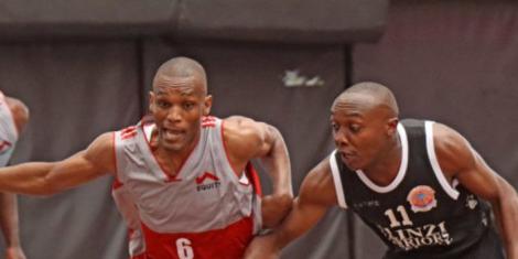 Equity Dumas player Victor Bosire (L) vying for the ball with Ulinzi Warriors star Eric Mutoro on August 29, 2022 in Nairobi.