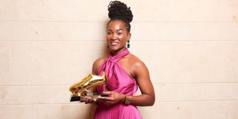 AC PAOK forward Esse Mbeyu Akida poses for a photo with her Golden Boot trophy in Greece on December 12, 2022