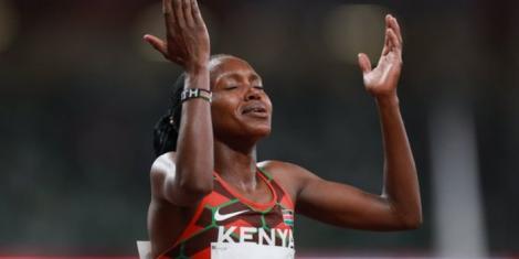 Faith Kipyegon celebrates winning a medal for Kenya at the delayed 2020 Tokyo Olympic Games in Japan.
