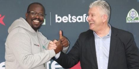 Gor Mahia Secretary General Sam Ochola (left) and Andreas Spier (right)