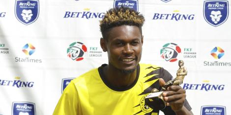 Tusker FC's Henry Meja displays his trophy