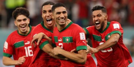 Moroccan players celebrate a goal during the 2022 FIFA World Cup in Qatar.
