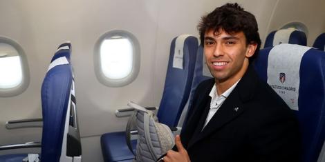 Portuguese international João Félix poses for a photo inside a plane on Monday, March 14, 2022.
