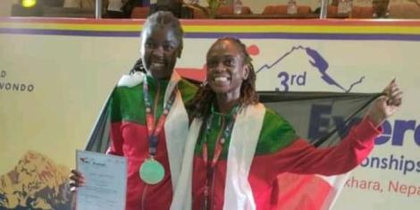 From left to right: Jully Musangi and Sharon Wakoli posing a for a photo at the 2022 Mount Everest Taekwondo Championship in Nepal on September 25.