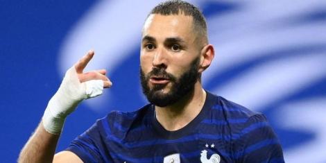 2022 Ballon d'Or winner Karim Benzema celebrates scoring for France in a past match.