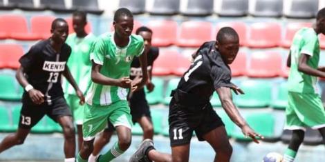 Kenya and South Sudan players in action at the International Hockey Federation (IHF) Zone five tournament on October 26, 2022 at Nyayo National Stadium.