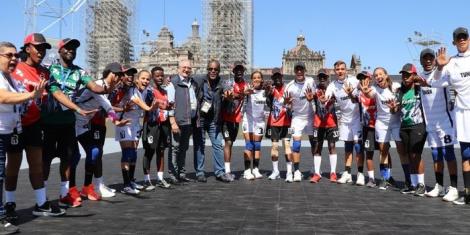 Kenyan and Tunisian Baseball players pose for a photo at the 2022 Baseball5 World Cup in Mexico.