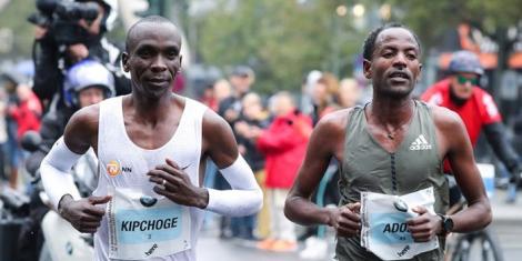 From left to right: Eliud Kipchoge running alongside Ethiopia's Guye Adola at the 2017 Berlin Marathon staged on September 24.