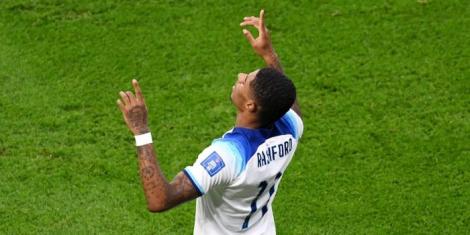 English forward Marcus Rashford celebrates scoring a goal against Wales at the 2022 FIFA World Cup on November 29 in Qatar.