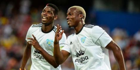 Paul Pogba (R) celebrating a goal with his brother Mathias Pogba in a friendly match in 2017.