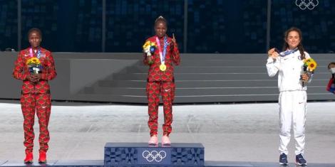 From left to right: Kenyan duo of Brigid Kosgei, Peres Jepchirchir and American runner Molly Seidel during the medal award ceremony at the 2020 Olympic Games in Japan.