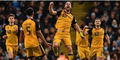 Port Vale celebrating a win after a match