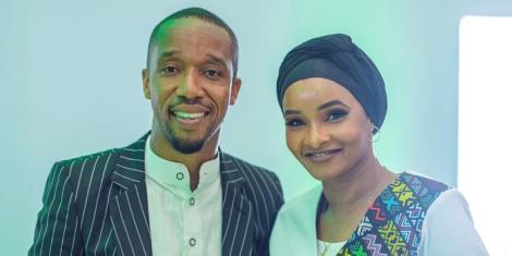 From left to right: Rashid Abdalla poses for a photo with his wife Lulu Hassan.