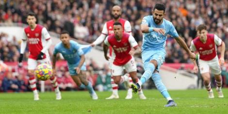 Manchester City winger Riyad Mahrez taking a penalty against Arsenal on January 1, 2022.
