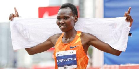 Ruth Chepngetich celebrates winning the 2021 Chicago Marathon title on October 10.