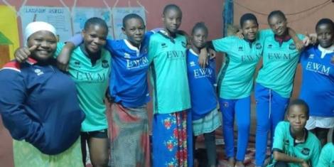 Beneficiaries of the donations from Carlisle United posing for a photo in Taru, Coastal Kenya on September 26, 2022.