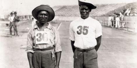 South African athletes Len Taunyane (R) and Jan Mashiani (L) posing for a photo at the 1904 Olympic Games held in St. Louis, United States.