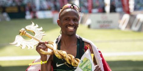Tete Dijana posing with his award after wining the 2022 Comrades marathon held on August 28, in South Africa.