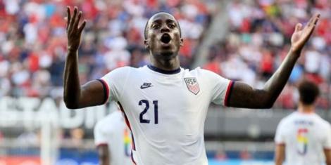 Timothy Weah celebrates scoring a goal for the United States in a past international match.