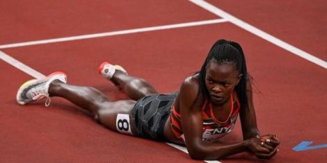 Kenya's runner Mary Moraa relaxing on the track during the postponed Tokyo 2020 Olympic Games in Japan.