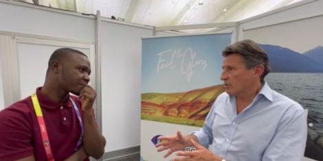 Ghanaian journalist Nabila Abdulai (L) speaking to World Athletics President Sebastian Coe (R) in Oregon, United States on July 25, 2022.