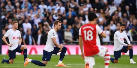 Tottenham Hotspur and Arsenal players taking the knee in a past Premier League match.