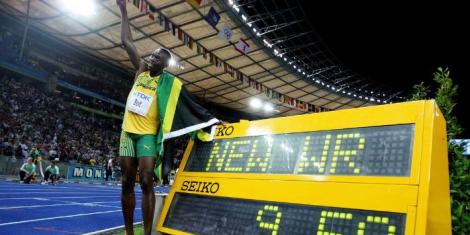 Jamaican sprinter Usain Bolt celebrating setting a new 100m record at the 2009 IAAF World Championships in Berlin, Germany.