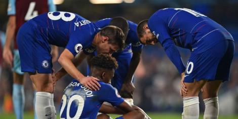 Chelsea players in action in a past football match.