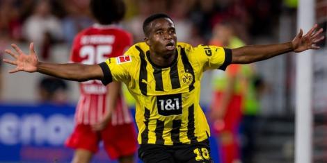 Youssoufa Moukoko celebrates scoring a goal for Borussia Dortmund on August 15, 2022.