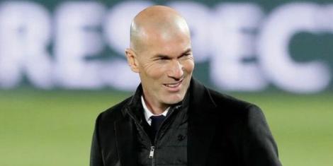 Former Real Madrid manager Zinedine Zidane reacts at the touchline in a past match.