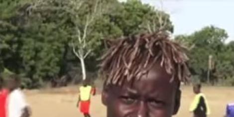 A file Image of Janet Amunga at a pitch  training her team