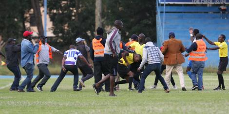 Fans attacking a referee